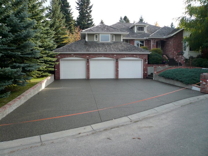 Professional Driveway Resurfacing by licensed contractor Rubber Stone Omaha