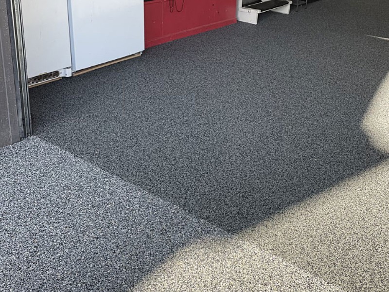 Professional garage floor coating services by licensed contractor